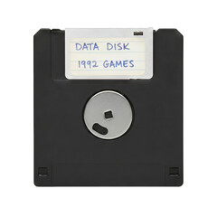 Fototapeta premium Vintage Floppy Disk Labeled Data Disk 1992 Games on Black Background