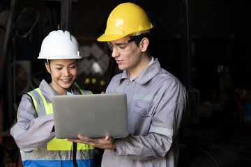 Engineer safety helmet laptop teamwork workshop factory industrial inspection planning collaborative engineers review plan laptop factory workshop, industrial safety gear and hard hat