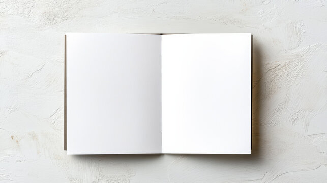 Blank open notebook mockup with two white pages textured surface showing minimal calm composition