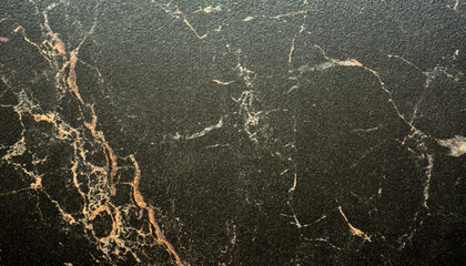 Black marble with white and orange veins, close-up, polished surface.
