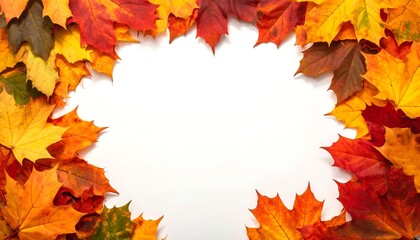 Fototapeta premium A vibrant border of colorful leaves creates an inviting frame around a blank, white space, perfect for seasonal designs