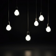 Minimalist scene featuring several glowing spherical bulbs hanging from thin cords against a deep, dark studio background, creating striking contrasts, bright, aesthetic, concept