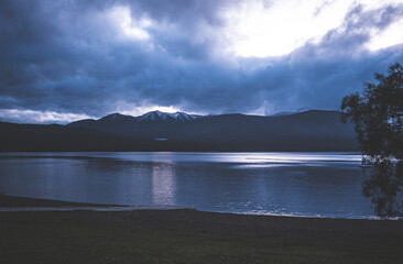 lake te anau new zealand dark evening blue hour landscape still calm