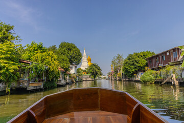 Fototapeta premium 27 November 2025 View of Temple Wat Paknam Phase Charoen with Large Golden statue of Buddha and sleeping Buddha on Klhong Dan a Canal river system in BKK Bangkok Thailand