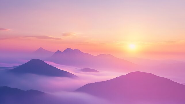 Serene sunrise mountain landscape with fog, pastel sky and distant light over peaks