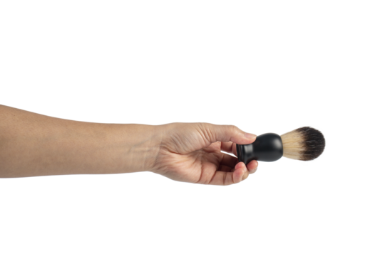 Small black dust brush in hand on a transparent background