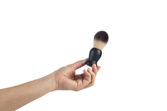 Small black dust brush in hand on a transparent background