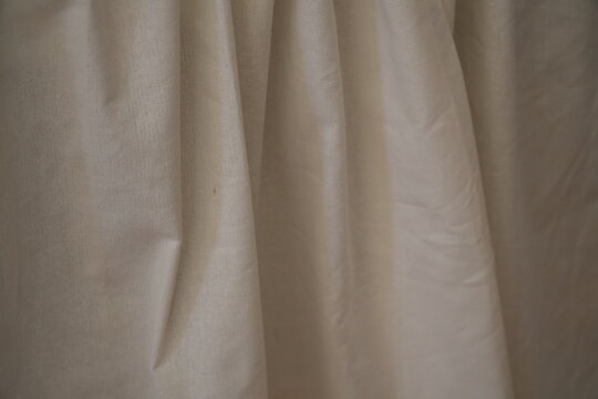 Elegant Beige Fabric Drape Texture Background