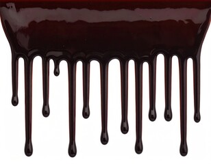 Dark, thick liquid dripping downwards