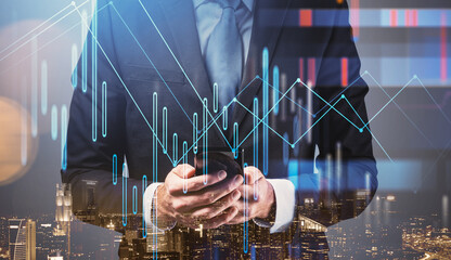 Businessman using smartphone with abstract financial charts overlay, modern design style, cityscape background, concept of investment and analytics