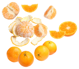 photograph displaying a dynamic arrangement of fresh oranges, including whole fruits, peeled sections, slices, and discarded zest, isolated on black.
