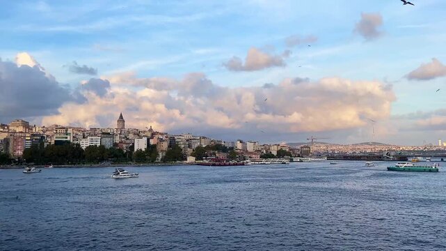 Karakoy Coastline, Galata Bridge and behind Galata Tower from Unkapani Bridge in Istanbul, Turkey. (4K Video)