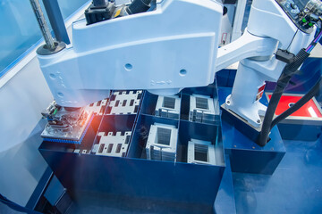 high technology sheet metal forming by robotic arm with hydraulic press brake machine. The sheet metal working operation by automatic system.