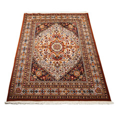 Intricate Persian Carpet with Detailed Floral Patterns in Red Blue and White Colors Isolated on Black Background with Visible Fringe