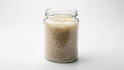 Jar of uncooked rice simple presentation on white for food storage and pantry organization concepts