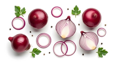 Overhead view of fresh red onions sliced and whole with parsley and peppercorns on white