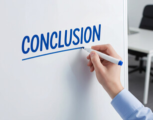 Hand Writing 'Conclusion' on a Whiteboard