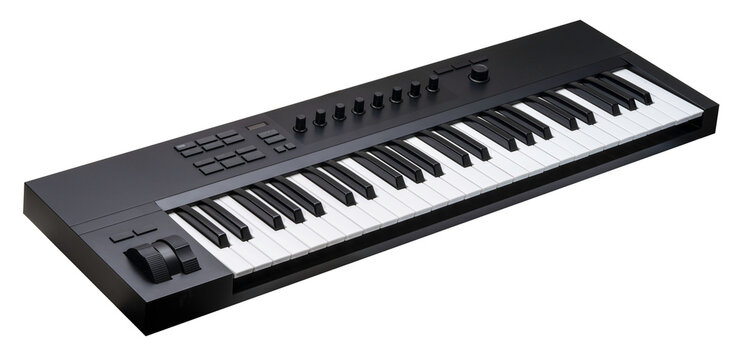 Black Synthesizer or MIDI controller keyboard is shown, featuring keys, knobs, and control buttons isolated on white background, Keyboard on White Background With clipping path PNG File.