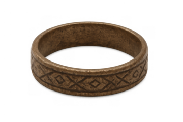 Ancient bronze ring presenting engraved tribal pattern, historical artifact, rustic metal jewelry with transparent background