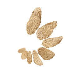 Rice flakes levitate on a white background