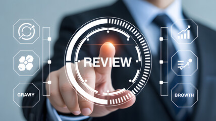 Man in suit pointing at review interface with growth and strategy icons on a light background