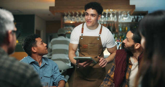 Waiter man, tablet and friends order at bar, talk and option for drinks, choice and wine list. People, group and server with tech, digital menu or app for customer experience with decision at pub