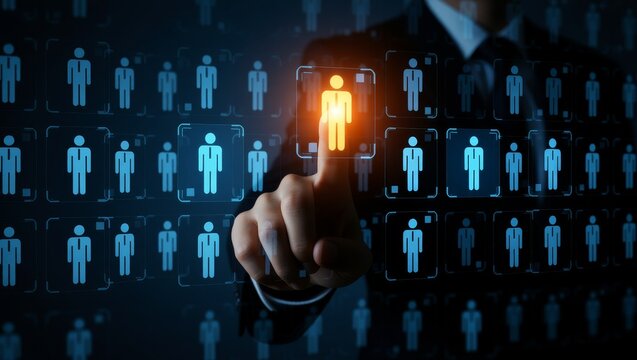 Hand selecting glowing human icon on digital grid