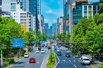A cityscape of traffic jam at the city street in Tokyo in summer