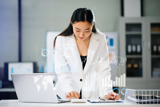 Financial report data of business operations balance sheet and income statement and diagram as Fintech concept.Business team meeting. digital tablet and computer laptop. - Powered by Adobe