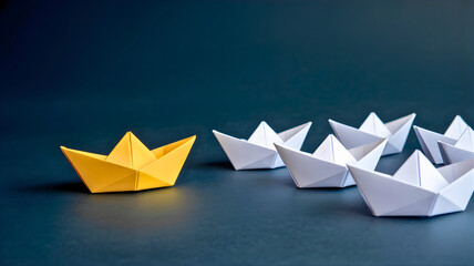 A vibrant yellow paper boat confidently leads a fleet of white origami boats, symbolizing strategic direction, innovation, and standout leadership on a deep blue background