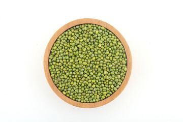 Whole green moong dal or mung beans or green gram (Vigna radiata) green legumes in wooden bowl