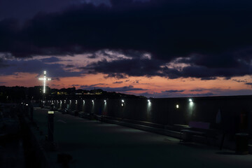 illuminated cross on a  pier