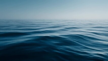 Serene ocean waves under clear blue sky for tranquil and peaceful imagery