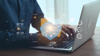 A professional workspace featuring a sleek laptop with holographic graphics representing data analysis and digital interaction, ideal for technology-focused projects. Qubit - Powered by Adobe