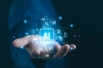 A futuristic concept of artificial intelligence showing a glowing AI icon floating above a business hand, surrounded by digital technology symbols representing innovation, analytics, cloud computing,