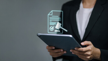 Business Tablet with Holographic Contract and Gavel Icon