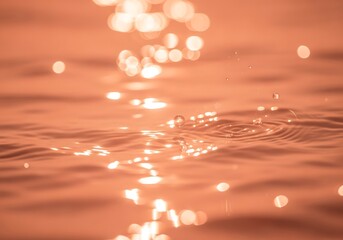 Warmth of Sunlight Reflected on Gentle Water Ripples and Soft Bokeh