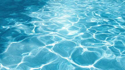 Obraz premium Sunlight reflects off the surface of the water creating rippling patterns in a sparkling swimming pool. The vibrant blue color enhances the refreshing atmosphere.