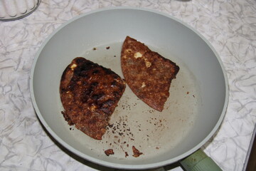 burnt food in a frying pan