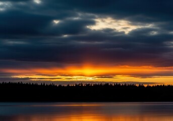 Dramatic sunset over a lake with dark clouds, creating a serene and picturesque landscape perfect for travel and nature themes