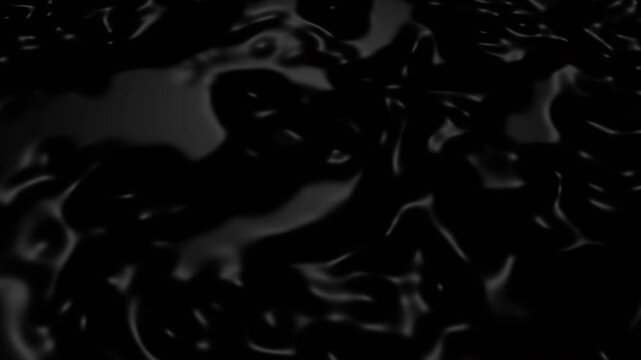 Dark Glossy Black Liquid Oil Ferrofluid Abstract Background