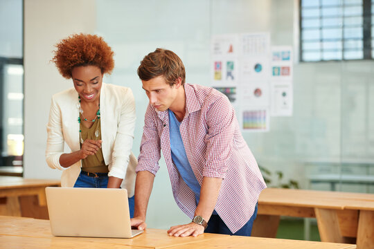 Man, woman and laptop at startup for graphic design review, happy and project management at office. People, team and smile with pc, planning and excited with feedback for proposal at creative agency