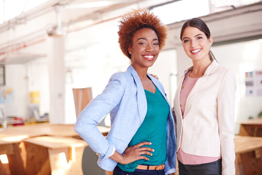 Portrait, business and women with smile in office for career pride, about us and real estate. Happy, people and housing agents with ambition, property development and team for listing opportunity - Powered by Adobe