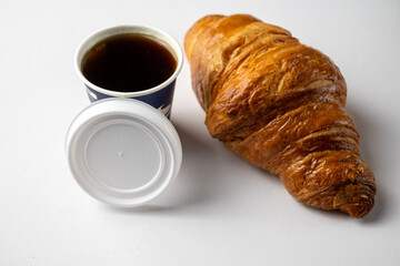 Fresh croissant and coffee