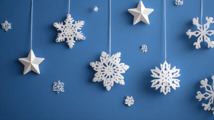 White paper Christmas ornaments on a vibrant #0000ff blue background, minimalist modern holiday style, neat paper-cut snowflakes and stars, clean premium composition