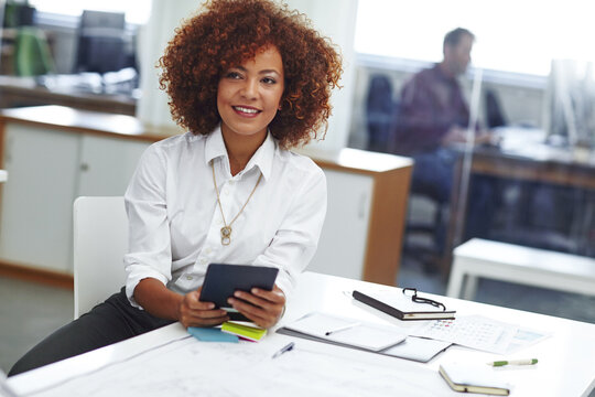 Happy woman, architect and tablet with blueprint for building design or planning in office. Female person, designer or technology with floor layout for architecture project or ideas in workplace