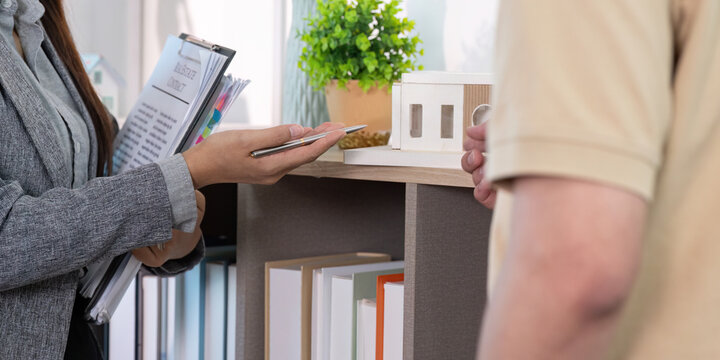 Real estate agent discussing property details with client