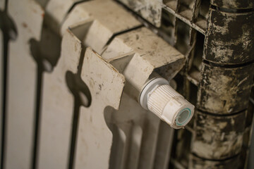 A used white oil battery from a house