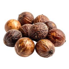 Obraz premium A pile of whole nutmeg seeds displayed against a stark black background.
