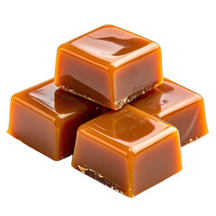 A stack of four glossy, square caramel candies isolated on a black background.